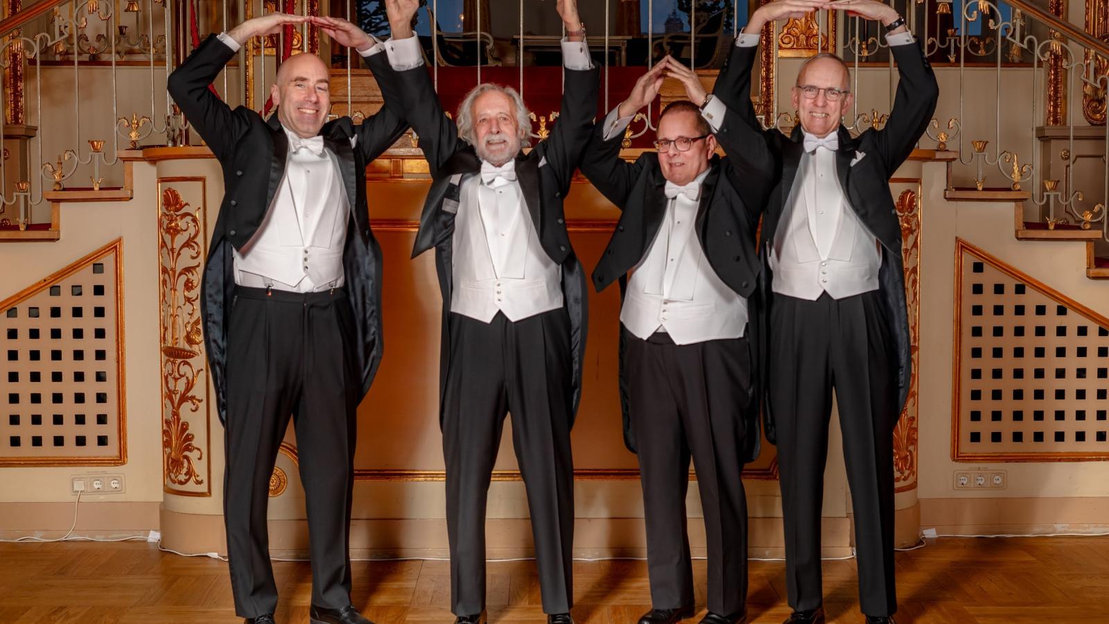 Before the Nobel Prize ceremony in Stockholm. Left to right, Michael Poirier, chair of physics; Pierre Agostini, professor emeritus of physics; Lou DiMauro, professor of physics; David Horn, dean of the College of Arts and Sciences